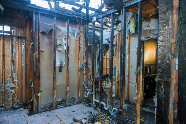 Professional Fire Damage Restoration technician working in Mauston, WI